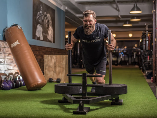 Bearded Men In Gym - Photo by Jesper Aggergaard on Unsplash